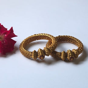 The Eniya Temple Gold Bangle